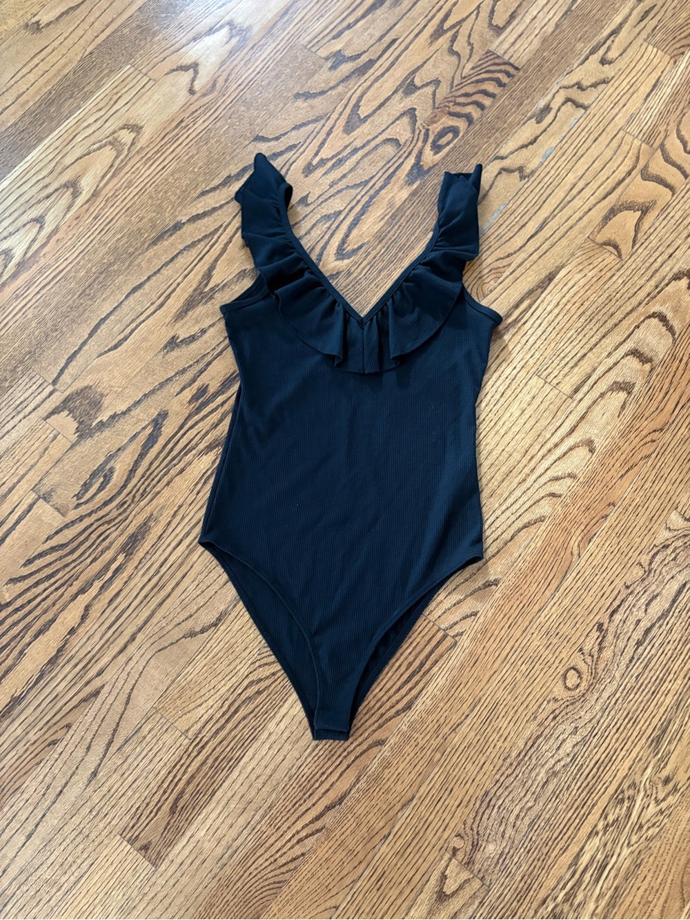 Socialite Black Ruffle Ribbed Bodysuit